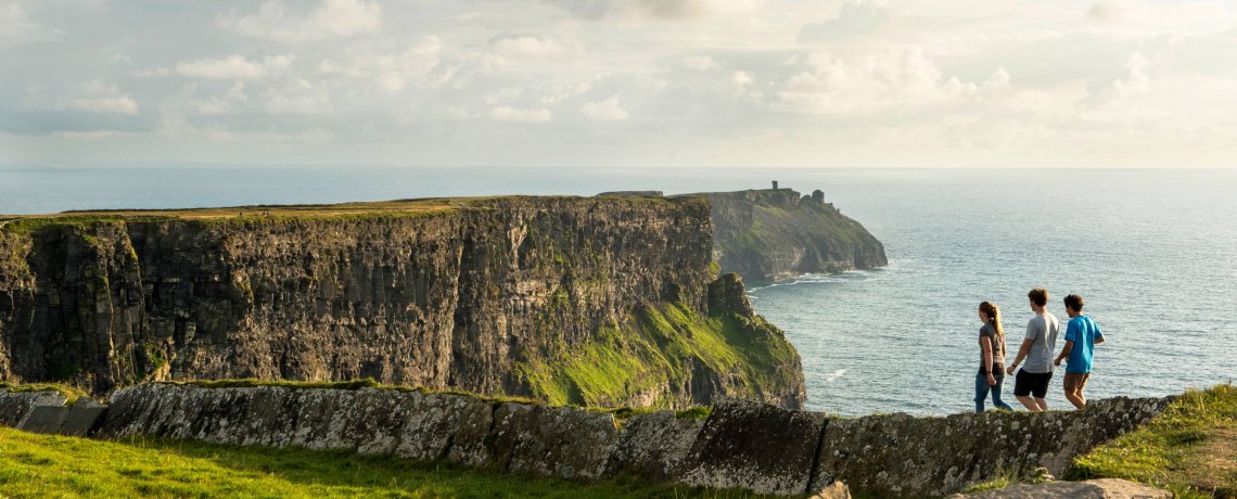 Friends-walking-the-cliff-top-walk-along-the-Cliffs-of-Moher_Co-Clare_master